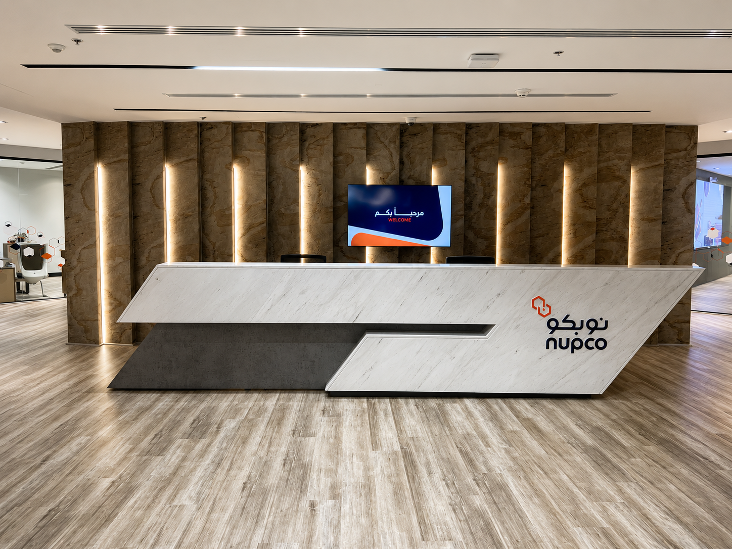 Modern hospitality counter featuring Skinrock West natural stone cladding, creating an elegant and durable surface for commercial interiors.