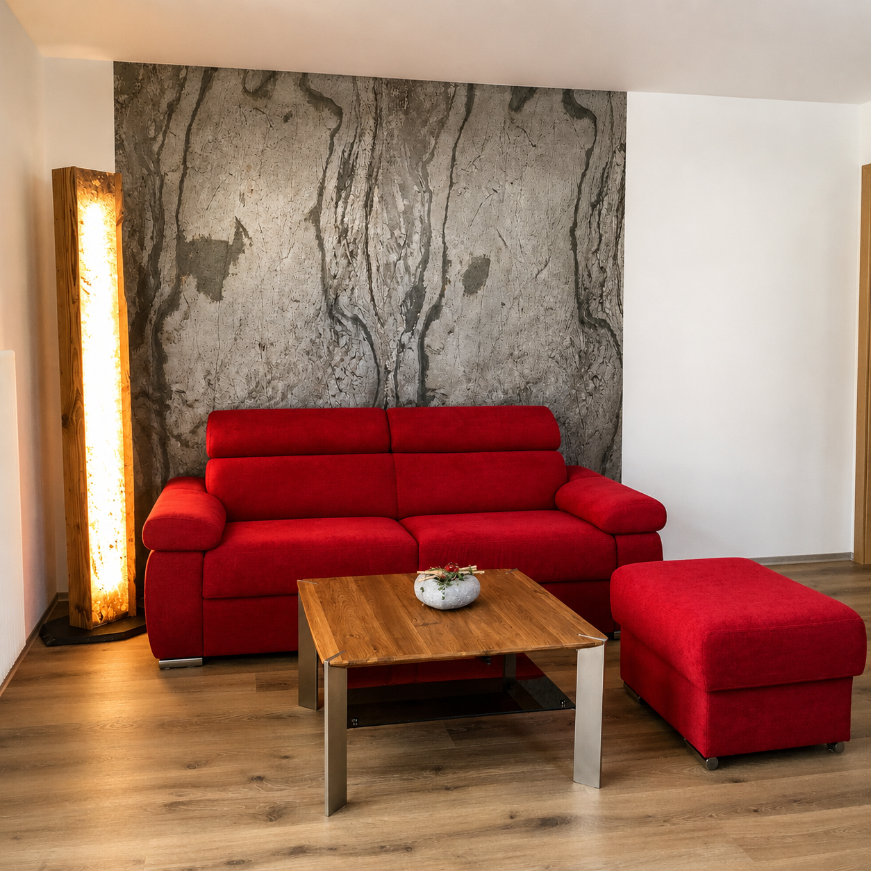 Modern living room featuring a Skinrock West natural stone accent wall that adds warmth, texture, and a contemporary architectural finish.