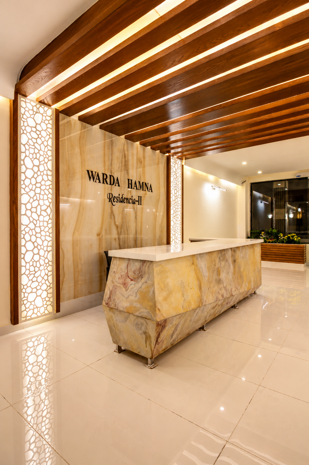Luxury reception counter finished with Skinrock West natural stone, showcasing a sophisticated and contemporary design.